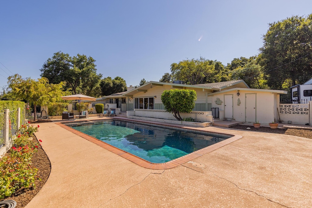 view of pool with a patio