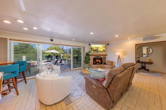 living room with crown molding and a textured ceiling