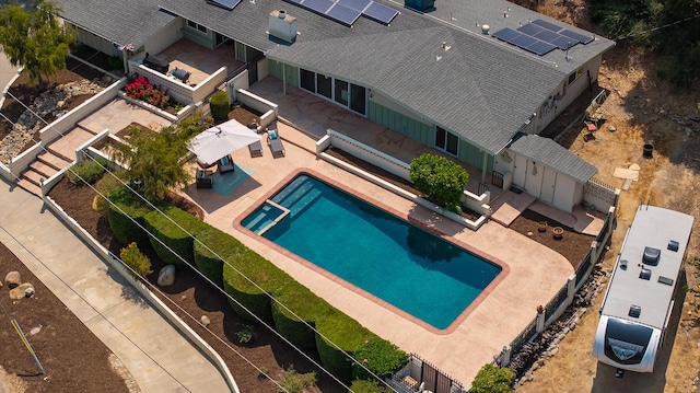 view of swimming pool with a patio area