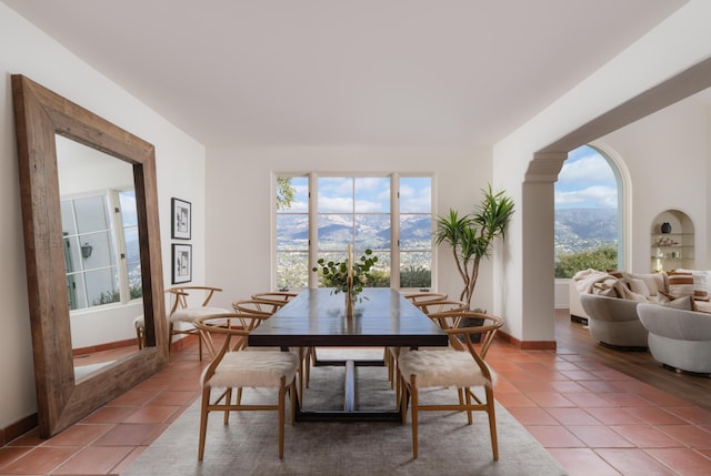 tiled dining area with a mountain view