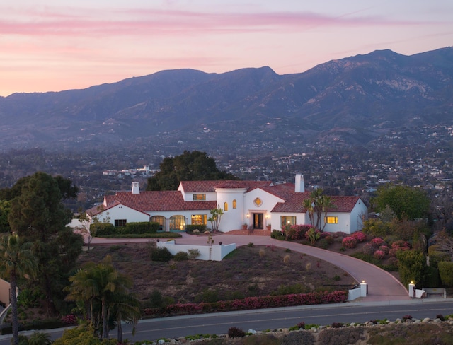 aerial view at dusk with a mountain view