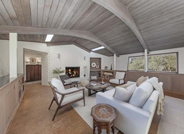 living room featuring a brick fireplace, wooden walls, lofted ceiling with beams, and wooden ceiling