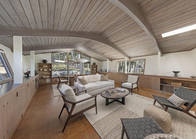 living room featuring a healthy amount of sunlight, vaulted ceiling with beams, and wood ceiling