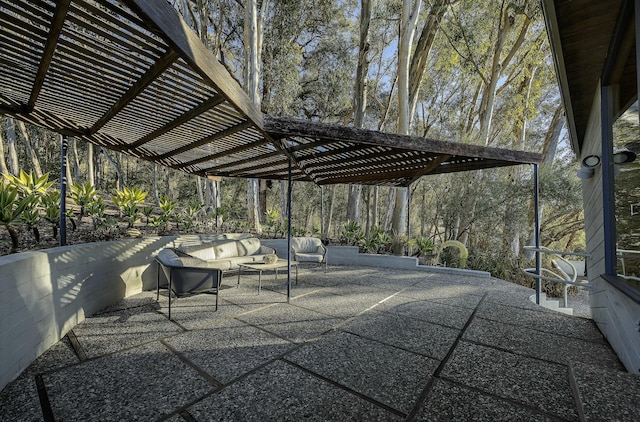 view of patio / terrace with outdoor lounge area and a pergola