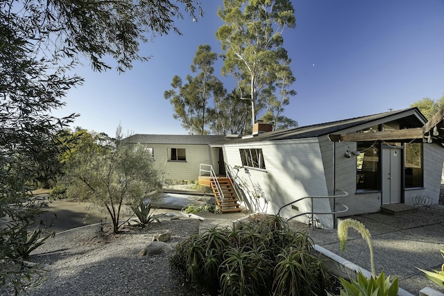 view of front facade with a patio