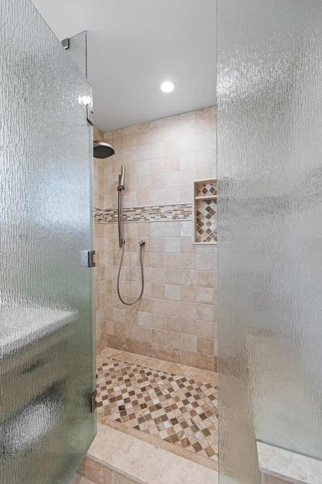 bathroom featuring an enclosed shower