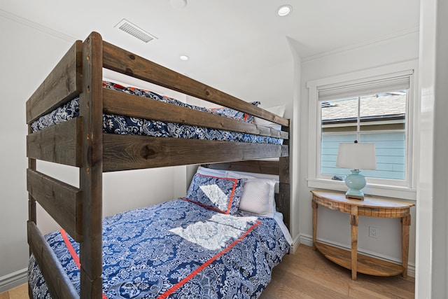 bedroom featuring light wood-type flooring