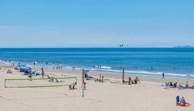 view of water feature with a beach view