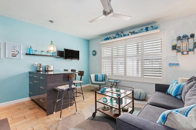 living room with ceiling fan