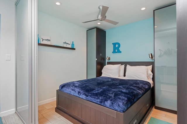 bedroom featuring ceiling fan and light wood-type flooring