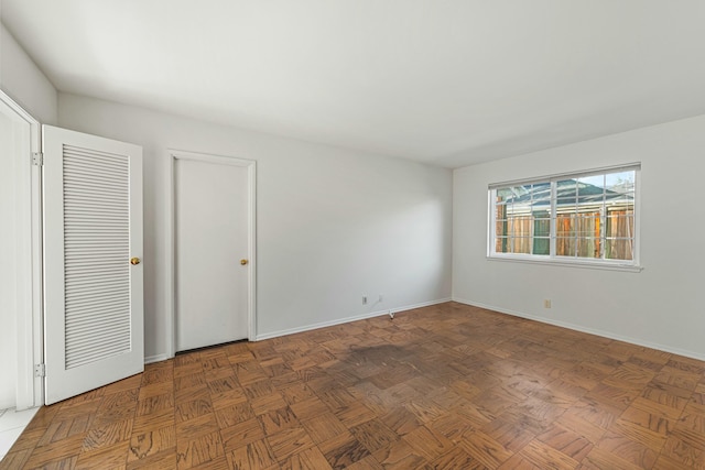 interior space featuring baseboards