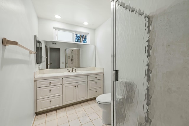 full bathroom featuring toilet, tile patterned floors, vanity, a shower stall, and recessed lighting