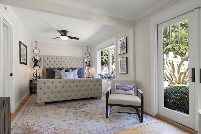 bedroom with crown molding, ceiling fan, access to exterior, and light hardwood / wood-style floors