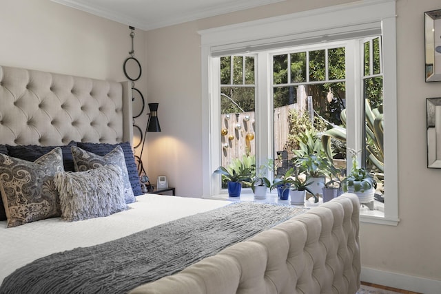 bedroom with crown molding