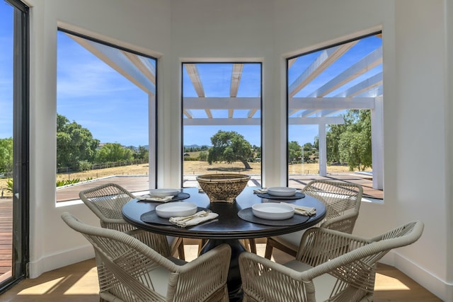 sunroom featuring a healthy amount of sunlight