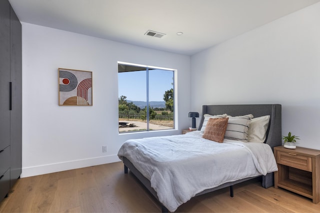 bedroom featuring light hardwood / wood-style floors