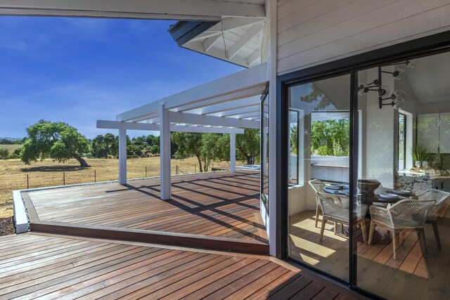 deck featuring a pergola