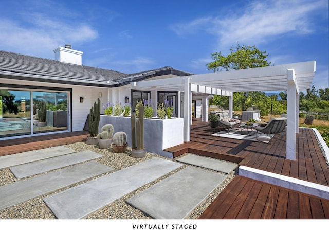 wooden deck featuring a pergola