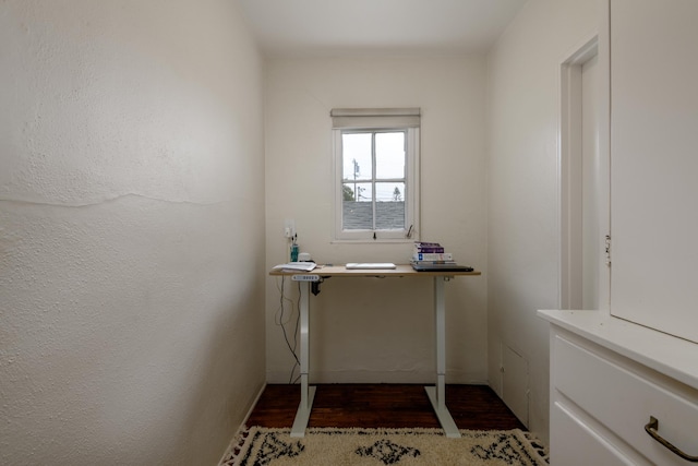 laundry room featuring dark wood-type flooring