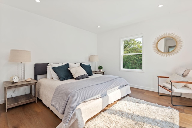 bedroom featuring wood-type flooring