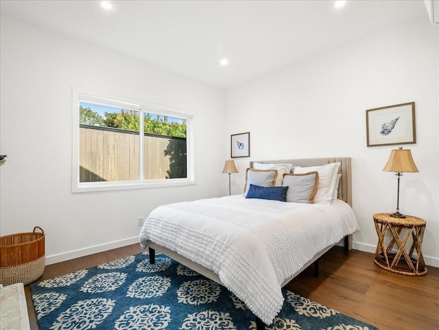 bedroom featuring recessed lighting, baseboards, and wood finished floors