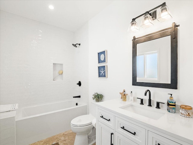 bathroom featuring shower / bath combination, vanity, and toilet