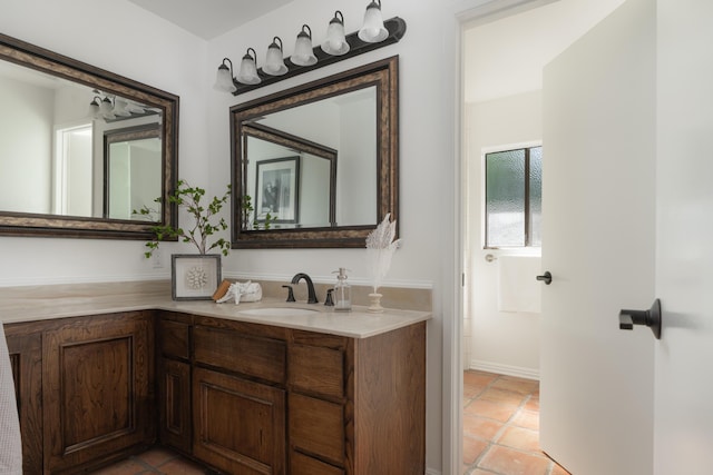 bathroom featuring vanity and tile patterned flooring