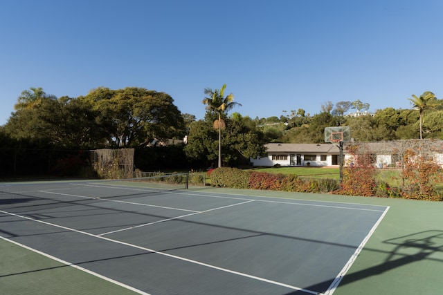 view of tennis court with basketball court