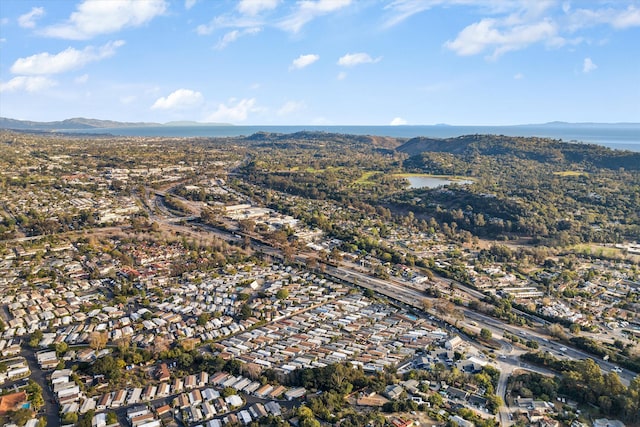 bird's eye view featuring a water and mountain view