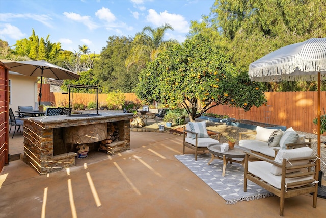 view of patio / terrace featuring an outdoor hangout area and an outdoor bar