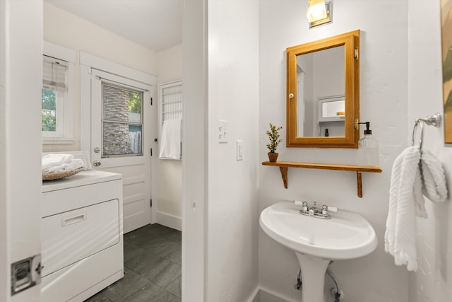 bathroom featuring washer / clothes dryer