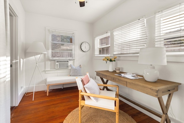 office space featuring cooling unit and wood-type flooring