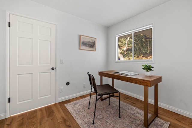 office space featuring dark hardwood / wood-style flooring