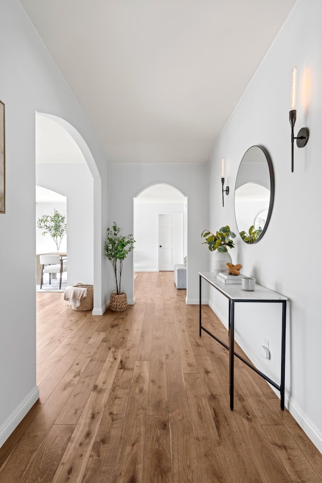 corridor featuring light hardwood / wood-style flooring