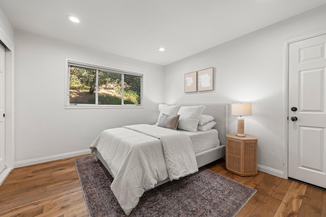 bedroom featuring hardwood / wood-style floors