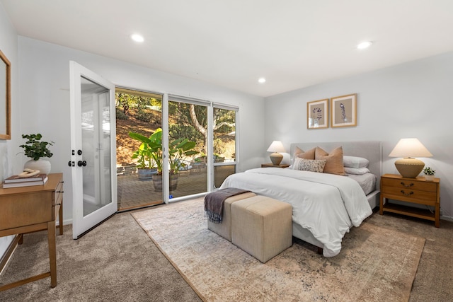 carpeted bedroom with access to exterior