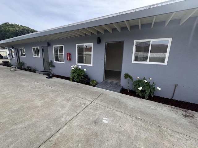 ranch-style house featuring a patio area