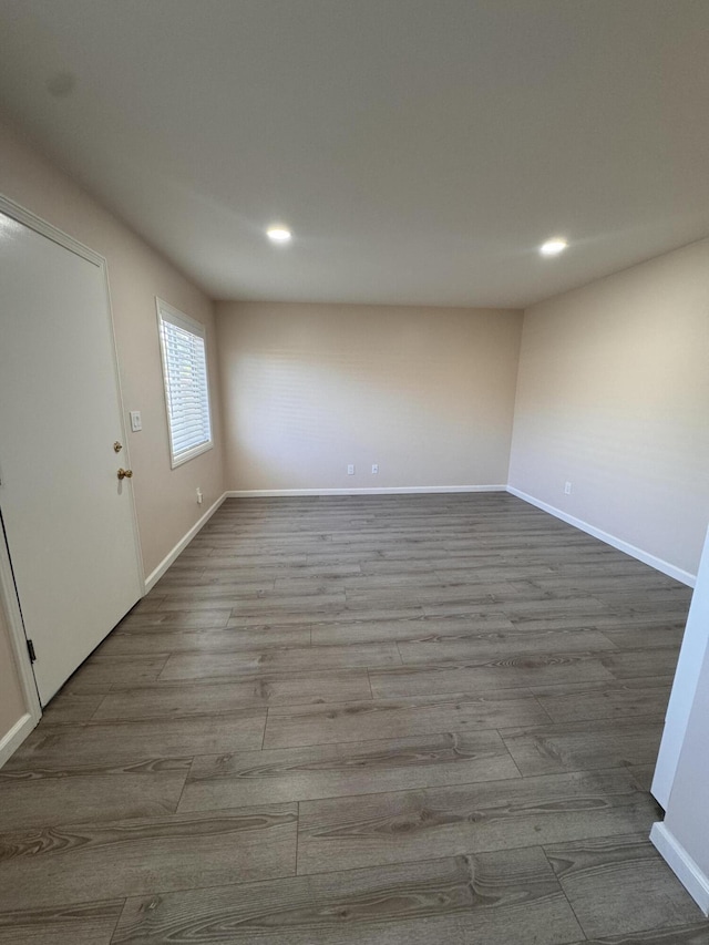 spare room featuring light wood-type flooring