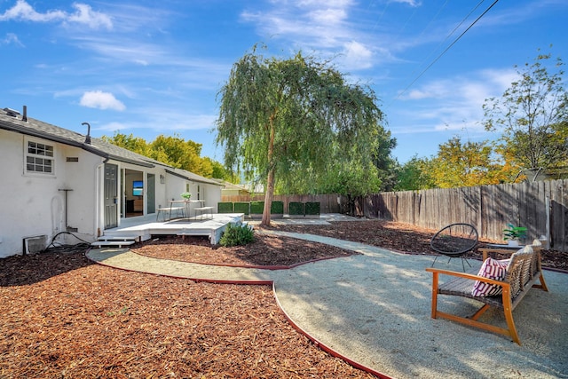 view of yard featuring a deck