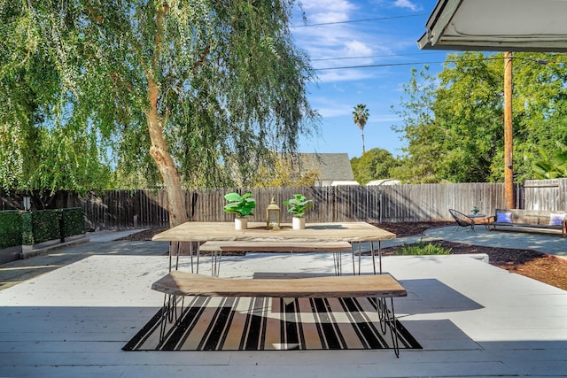 view of patio / terrace featuring a wooden deck