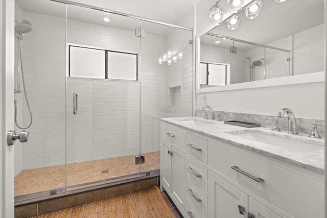 bathroom with vanity and walk in shower