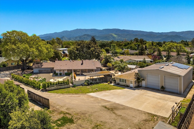 drone / aerial view featuring a mountain view