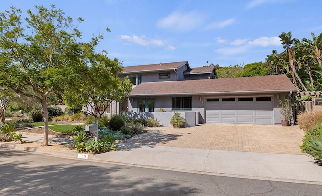 view of front of property featuring a garage