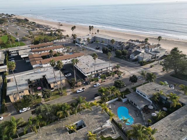 drone / aerial view with a view of the beach and a water view