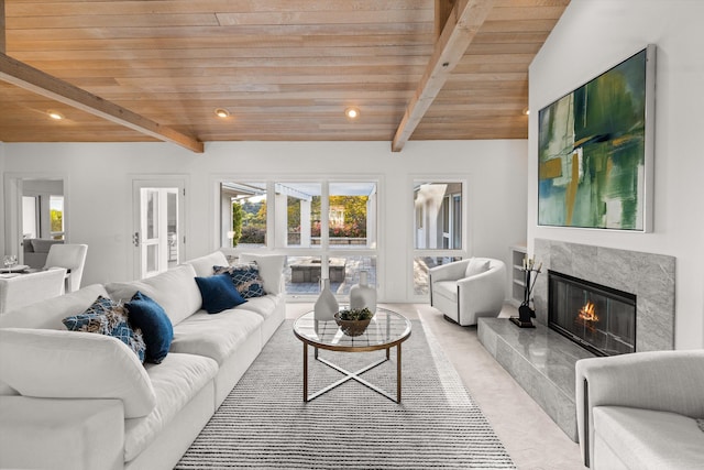 carpeted living room with a healthy amount of sunlight, a fireplace, and wooden ceiling