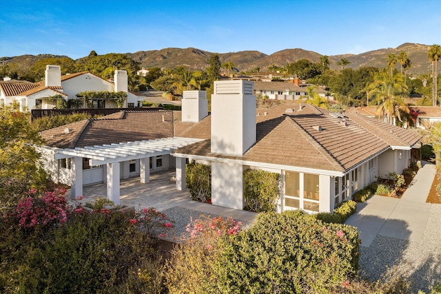 view of front facade featuring a mountain view