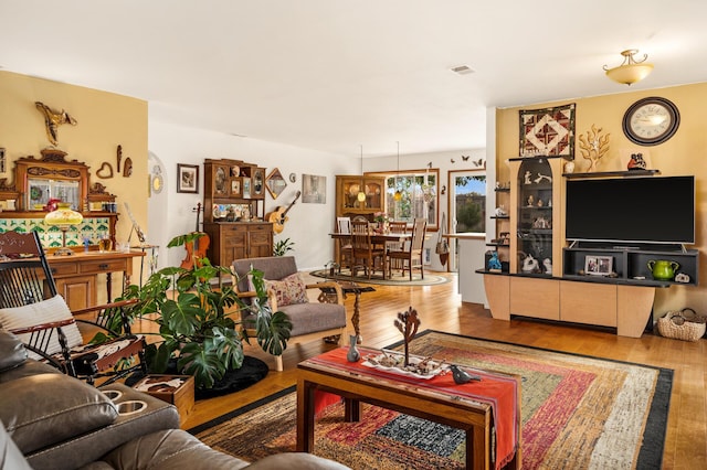 living room with hardwood / wood-style flooring