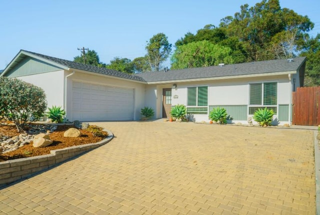 single story home with a garage