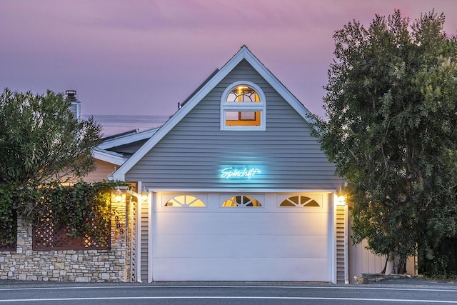 view of front of home with a garage