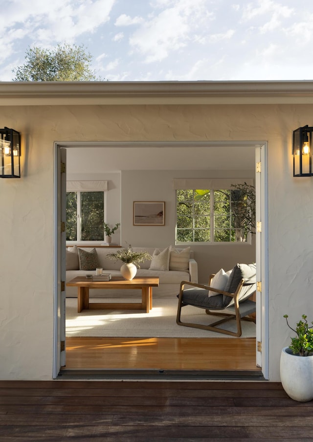 wooden deck featuring an outdoor living space